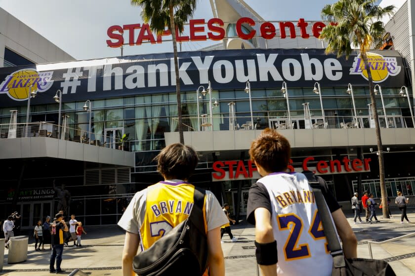 LOS ANGELES, --APRIL 13, 2016-- On the morning of Kobe Bryant's final game as a Los Angeles Laker, fans gathered early outside Staples Center, in downtown, Los Angeles, CA, April 13, 2016. (Jay L. Clendenin / Los Angeles Times)