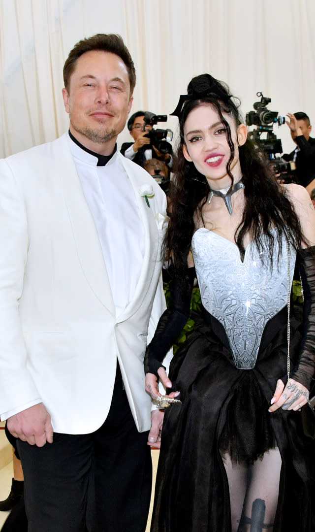 NEW YORK, NY – MAY 07: Elon Musk and Grimes attend the Heavenly Bodies: Fashion & The Catholic Imagination Costume Institute Gala at The Metropolitan Museum of Art on May 7, 2018 in New York City. <em>Photo by Dia Dipasupil/WireImage.</em>