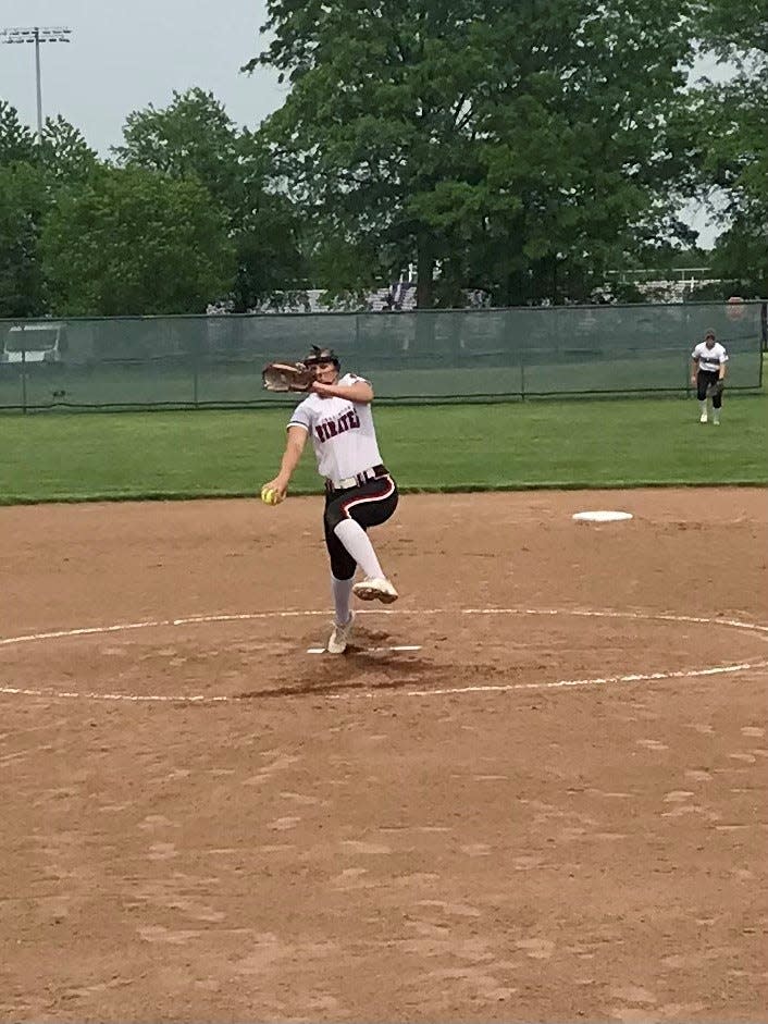Cardington pitcher Genevieve Longsdorf delivers a pitch to Centerburg during a 5-1 Division III district championship victory Friday night at Pickerington Central.