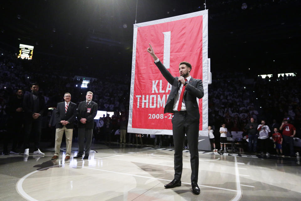 Golden State Warriors and former Washington State guard Klay Thompson speaks as the school retired his jersey number during halftime of an NCAA college basketball game between Washington State and Oregon State in Pullman, Wash., Saturday, Jan. 18, 2020. (AP Photo/Young Kwak)