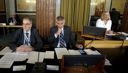 Senior officials of a parliamentary investigation into who bears political responsibility for the defunct Australian bank Hypo Alpe Adria wait for the start of the first session in Vienna April 8, 2015. REUTERS/Heinz-Peter Bader