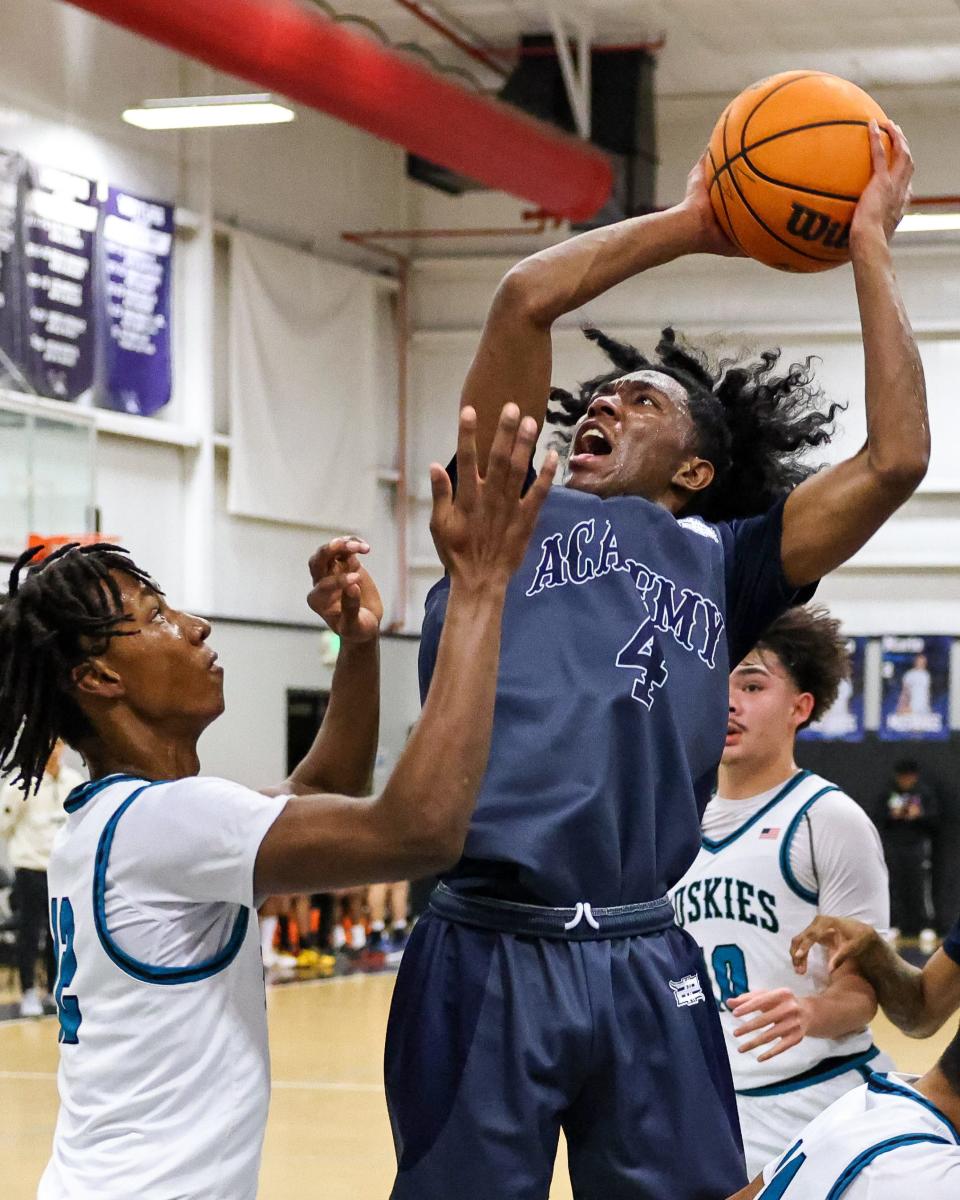Venture Academy’s DaeLeon Neal(4) gives his all as he heads down the lane during a game against Sheldon High of Sacramento at Venture Academy gymnasium in Stockton, CA
