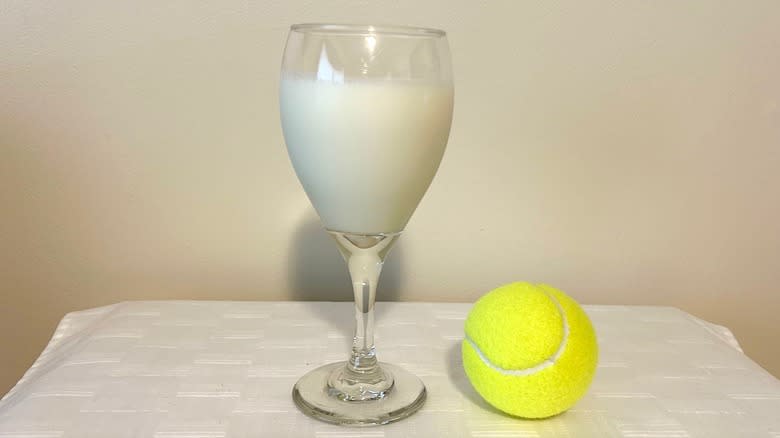 Milk and tennis ball