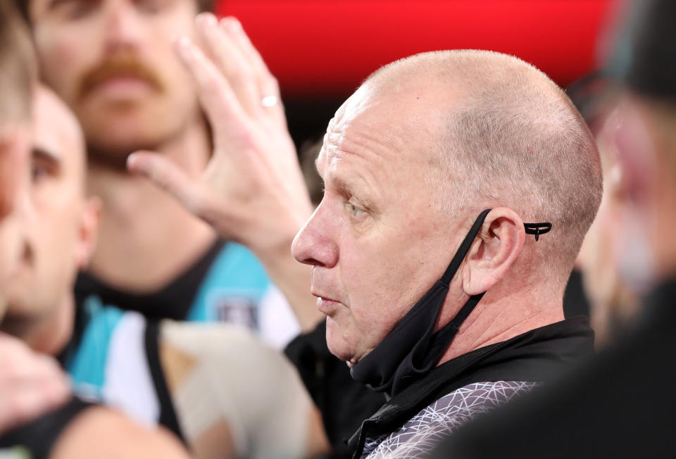 Power coach Ken Hinkley is seen here addressing his players in the AFL preliminary final against the Bulldogs.