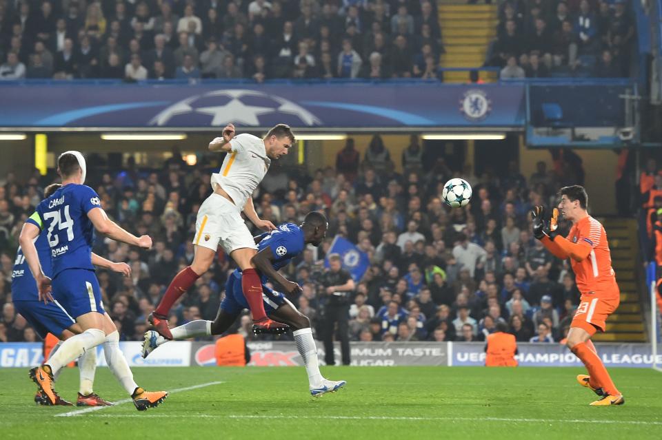 Edin Dzeko equalized with a stunning volley, then put Roma ahead with a header, but the match at Chelsea ended 3-3. (Getty)