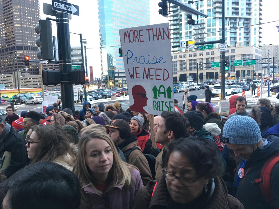 About 200 teachers participate in a rally outside Denver Public School headquarters in downtown Denver, Thursday, Jan. 24, 2019. Teachers have overwhelmingly voted to strike but their plans to walk off the job have been placed on hold after the district asked the state to intervene. (AP Photo/P. Solomon Banda)