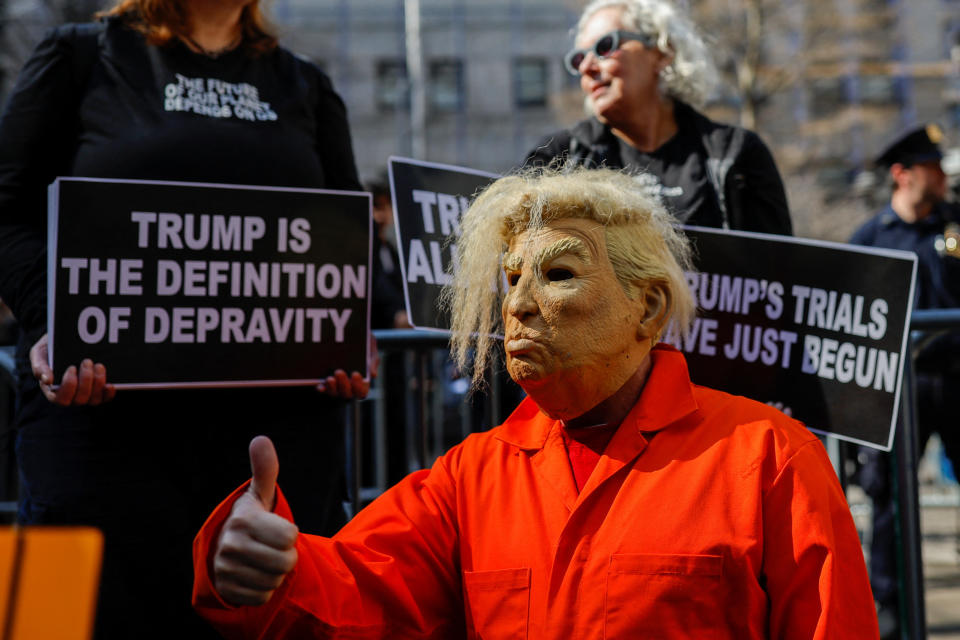 Anti-Trump protesters demonstrate outside the Manhattan Criminal Courthouse on  April 4. (Amanda Perobelli/Reuters)