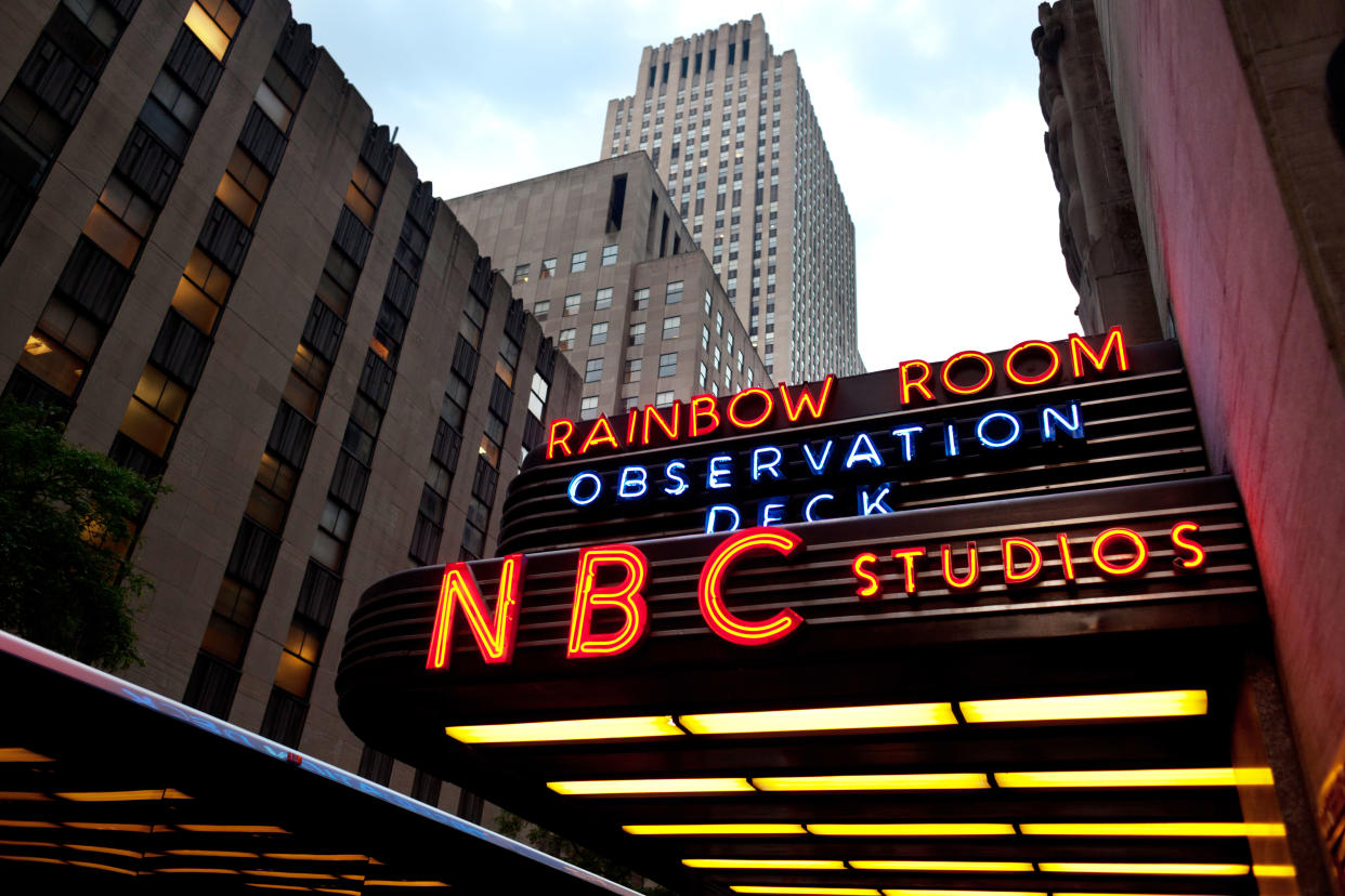 New York, USA - June 10, 2012: View at the entrance to NBC Studios and surrounding buildings. The NBC Studios are located in the historic GE Building on 49th Street, between Fifth and Sixth Avenue in Manhattan, New York.