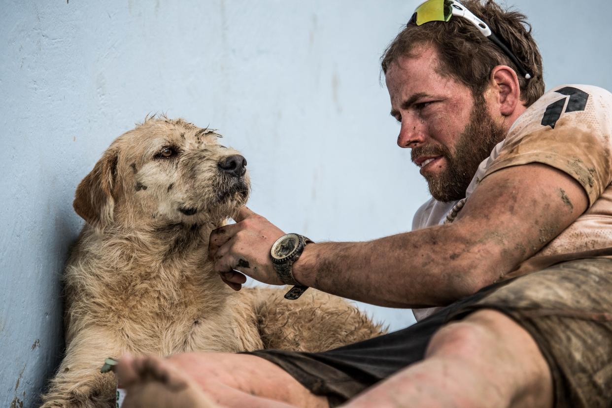 Mikael Lindnord and the real Arthur during the adventure racing world championship.