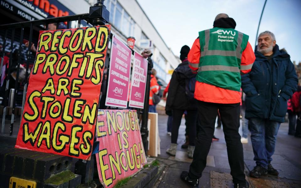 Postal workers on the picket line at the Kilburn Delivery Office in north west London - Aaron Chown/PA Wire