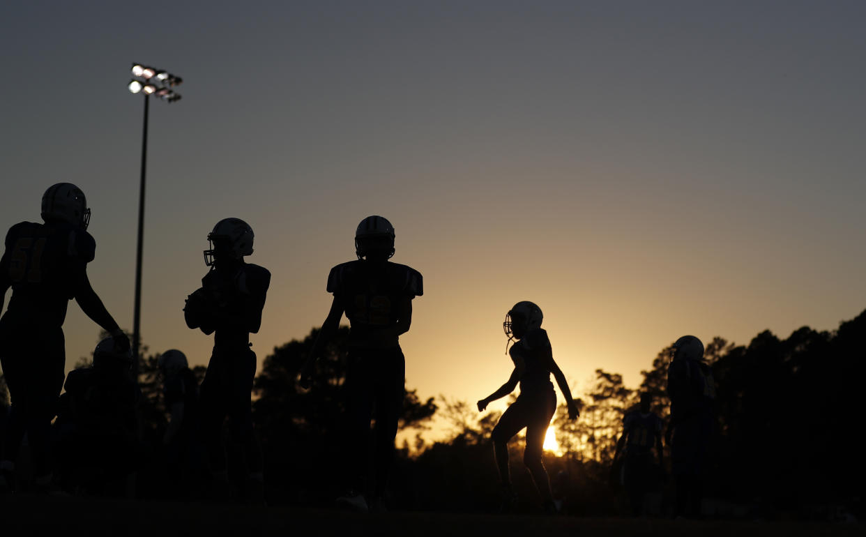 If schools can’t or choose not to provide proper medical oversight of a violent game played in extreme conditions, should they be allowed to host football games in the first place? (AP)