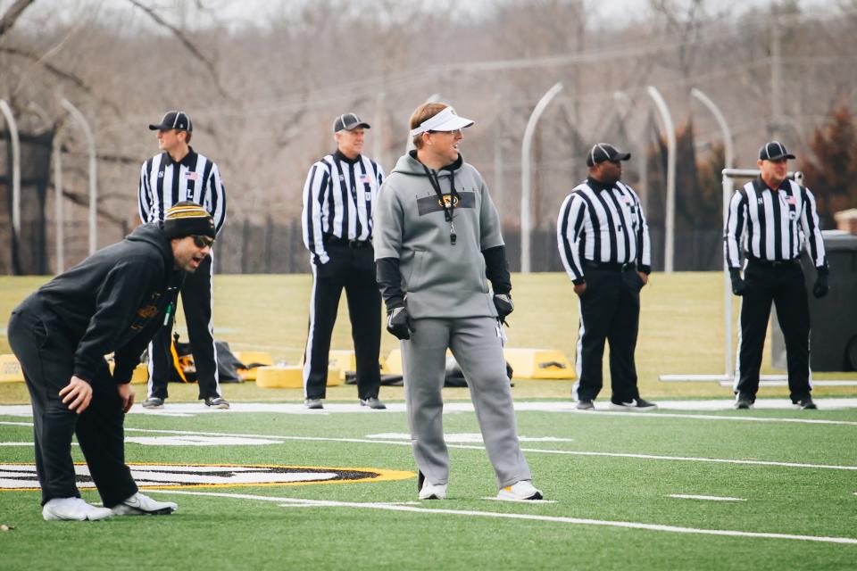 Missouri head football coach Eli Drinkwitz watches his players during a practice March 8 at the Mizzou Athletic Training Complex.