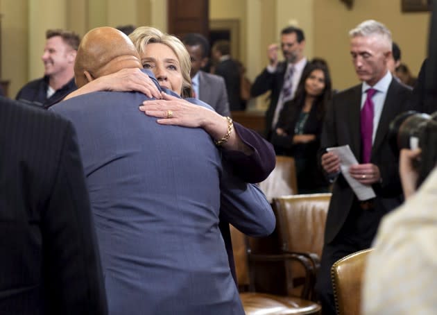 Clinton embraces Rep. Elijah Cummings after her 11-hour Benghazi testimony last fall. Committee chairman Rep. Trey Gowdy is to the right. (Joshua Roberts / Reuters)