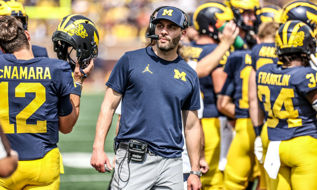 Michigan football coach suspended due to alleged ‘computer crimes’