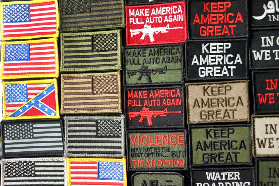 Patches are offered for sale by a vendor during a Second Amendment March outside of the Michigan state capital building on September 23, 2021 in Lansing, Michigan.