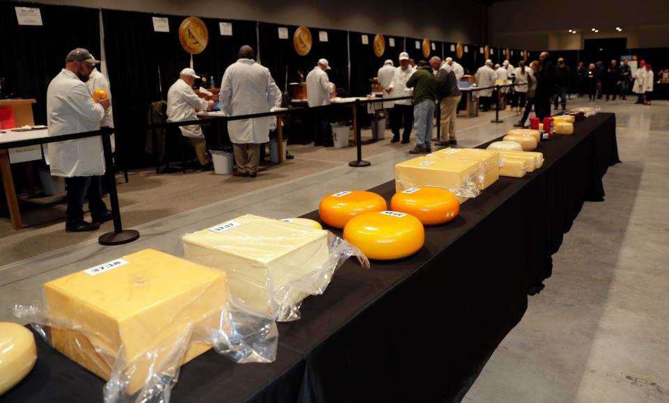 A row of cheese entries at the U.S. Championship Cheese Contest on Feb. 21, 2023, at the Resch Expo in Ashwaubenon, Wis.