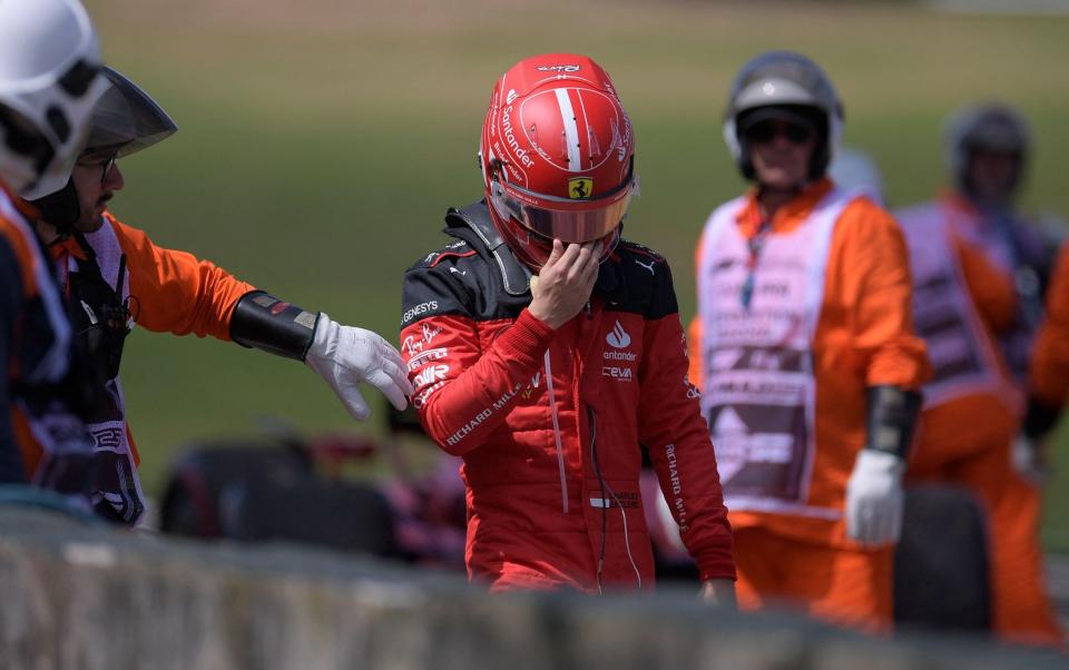 Ferrari's Monegasque driver Charles Lecler leaves the track after crashing at the start of the Formula One Brazil Grand Prix