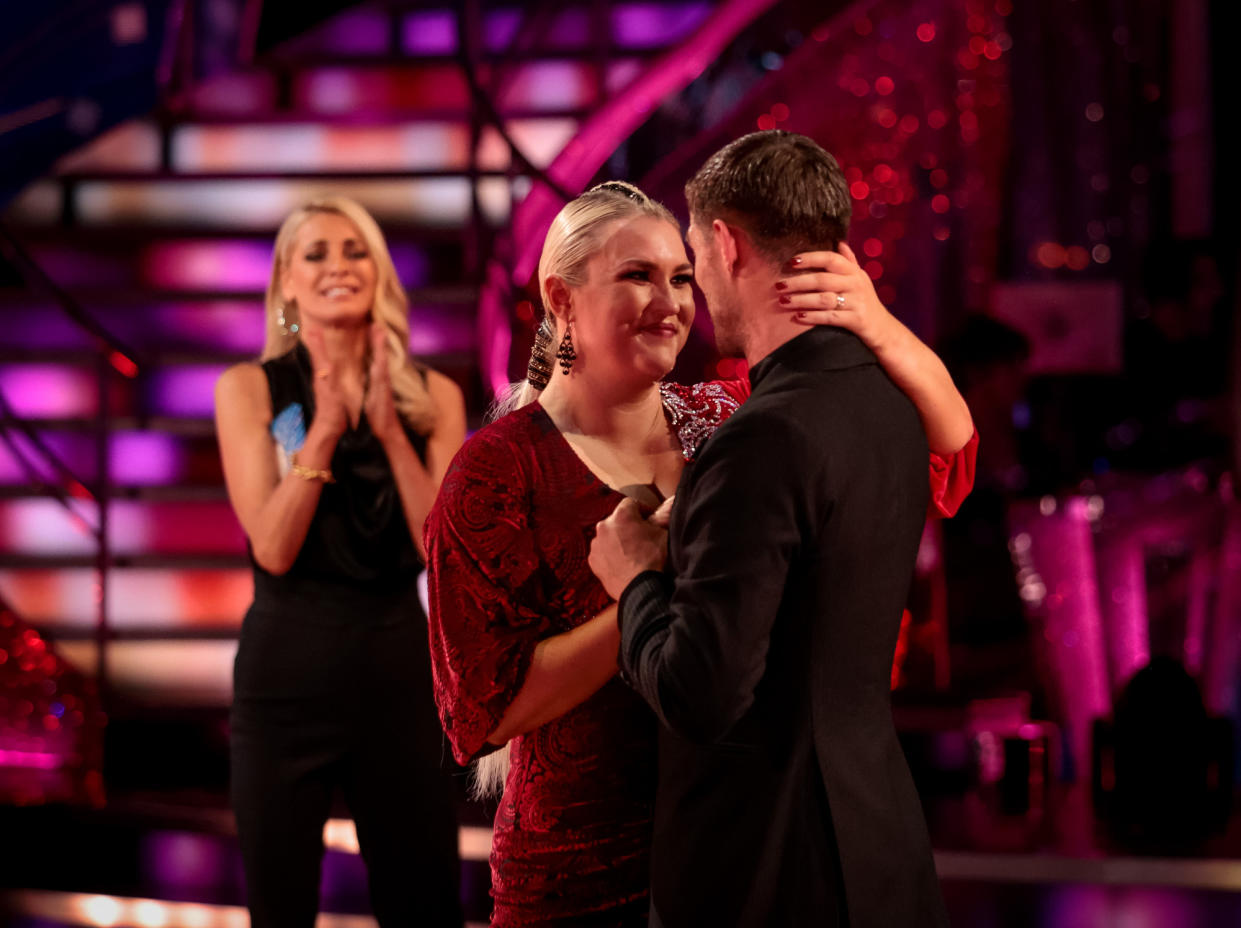 WARNING: Embargoed for publication until 20:00:00 on 14/11/2021 - Programme Name: Strictly Come Dancing 2021 - TX: 14/11/2021 - Episode: n/a (No. n/a) - Picture Shows: **RESULTS SHOW - EMBARGOED FOR PUBLICATION UNTIL 20:00 HRS ON SUNDAY 14TH NOVEMBER 2021**

Sara and Aljaz take their final dance Tess Daly, Sara Davies, Aljaz Skorjanec - (C) BBC - Photographer: Guy Levy