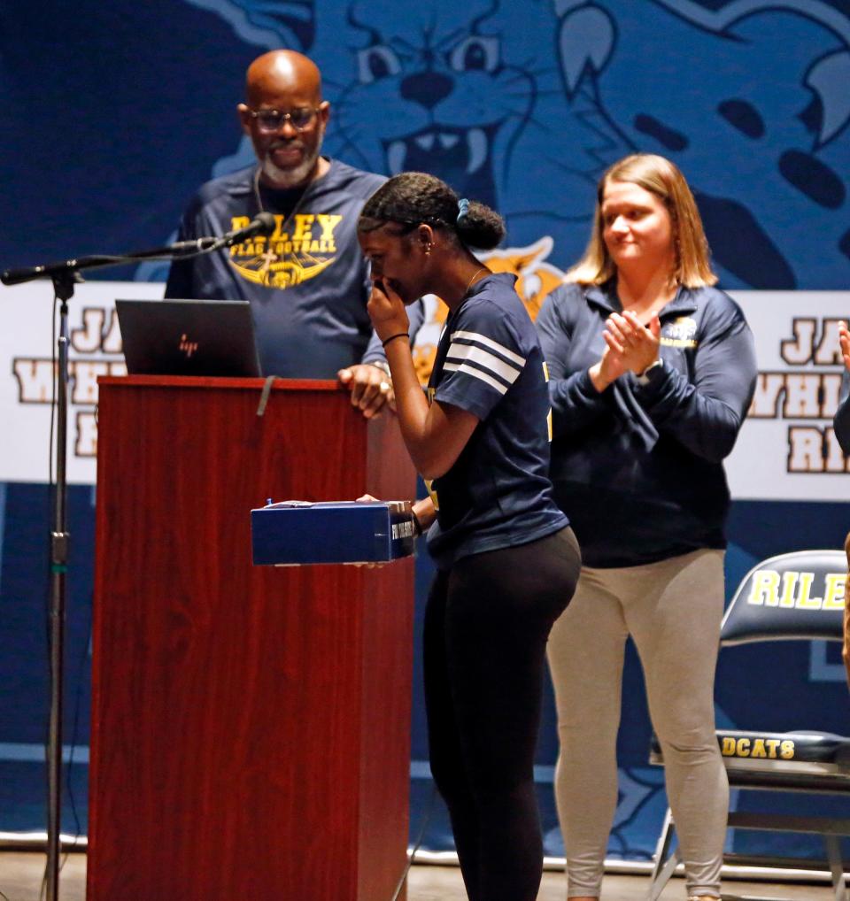 South Bend Riley junior Kayla Wright gets emotional after being selected to attend the upcoming NFL Draft on the Indianapolis Colts behalf during a presentation at the school Thursday, April 11, 2024.