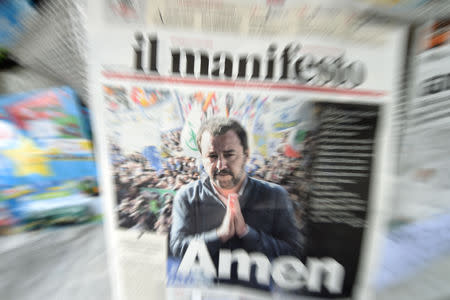 A newspaper printed with the front page image of Italian Deputy Prime Minister and League party leader Matteo Salvini is displayed at a newsstand, following the European Parliamentary election results in the rise of the far-right League party in Milan, Italy May 27, 2019. REUTERS/Guglielmo Mangiapane