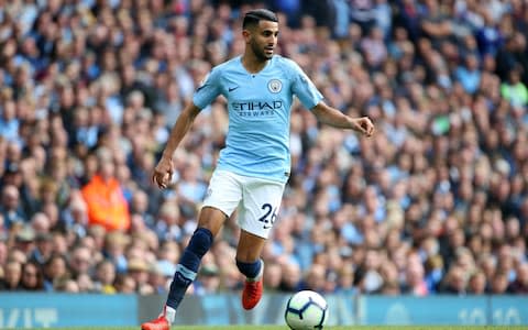 Riyad Mahrez of Manchester City runs with the ball during the Premier League match between Manchester City and Burnley - Credit: GETTY IMAGES