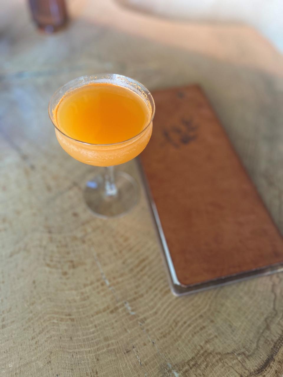 The What’s Up Doc? cocktail at MeeshMeesh Mediterranean in Louisville is made with lemon, carrot, ginger, and vodka.