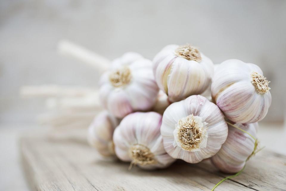 <p>Garlic is a serious wellness wonder, especially for women over 40. “Studies suggest that garlic can <a href="https://www.prevention.com/health/health-conditions/g19562412/osteoporosis-exercises-to-avoid/" rel="nofollow noopener" target="_blank" data-ylk="slk:minimize bone loss;elm:context_link;itc:0;sec:content-canvas" class="link ">minimize bone loss</a> by increasing estrogen levels. It is also nutrient-rich with very few calories and adds flavor to foods so you’re satisfied with less,” Mirkin says.</p><p><strong>Try it:</strong> <a href="https://www.prevention.com/food-nutrition/recipes/a20520320/creamy-roasted-garlic-soup/" rel="nofollow noopener" target="_blank" data-ylk="slk:Creamy Roasted Garlic Soup;elm:context_link;itc:0;sec:content-canvas" class="link ">Creamy Roasted Garlic Soup</a></p>