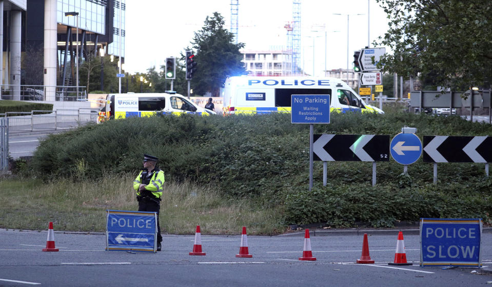 Police investigate near Forbury Gardens in the town centre of Reading, England, where they are responding to a "serious incident" Saturday, June 20, 2020. (Steve Parsons/PA via AP)