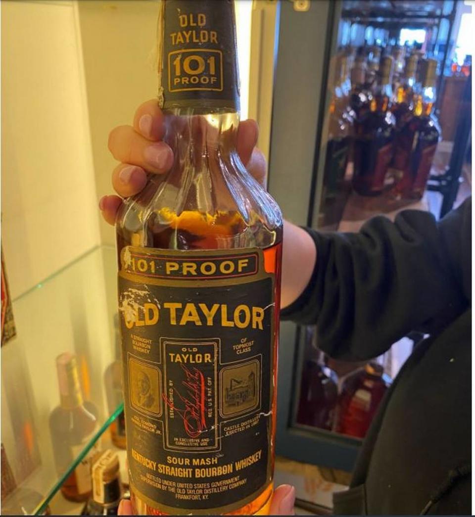 A bottle of Old Taylor 101, photographed by Kentucky Alcohol Beverage Control in Justins’ House of Bourbon before it was seized. In Franklin Circuit Court, Justins’ alleged the “near-priceless bottle,” one of only two known to exist, was damaged while in ABC custody. The state produce this photo to rebut that claim. Court filing