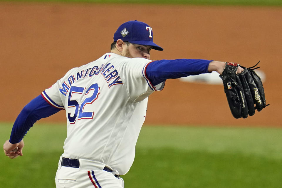 Texas Rangers starting pitcher Jordan Montgomery throws against the Arizona Diamondbacks during the first inning in Game 2 of the baseball World Series Saturday, Oct. 28, 2023, in Arlington, Texas. (AP Photo/Julio Cortez)