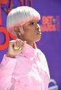 <p>DeJ Loaf rocked a classic metallic mushroom haircut that accentuated her bright yellow eyeliner. (Photo: Getty Images) </p>