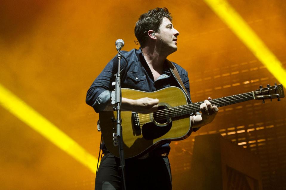 Mumford & Sons band member Marcus Mumford performs on Wednesday, Aug. 28, 2013 at the West Side Tennis Club in the Forest Hills neighborhood of the Queens borough of New York. (Photo by Charles Sykes/Invision/AP)