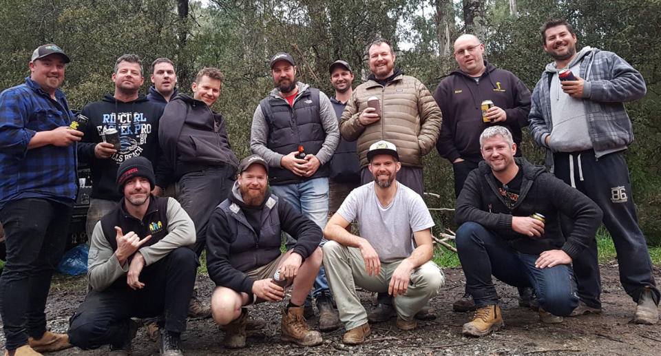 Andrew Owen (second from left, standing) and Clint Dent (sixth from left, top row) suffered serious injuries. Source: Facebook/ Chris Weir