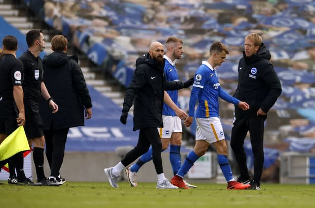 Graham Potter, right, waits for referee Chris Kavanagh at the final whistle