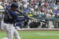Tampa Bay Rays' Christian Bethancourt hits a single during the third inning of a baseball game against the Milwaukee Brewers Tuesday, Aug. 9, 2022, in Milwaukee. (AP Photo/Morry Gash)