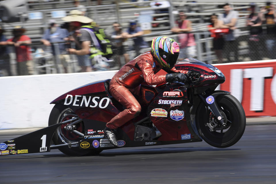 In this photo provided by the NHRA, Pro Stock Motorcycle points leader Matt Smith wins the Lucas Oil NHRA Winternationals over Angelle Sampey in the final round thanks to his 6.828-second run at 199.52 mph, Sunday, Aug. 1, 2021, in Pomona, Calif. (Jerry Foss/NHRA via AP)