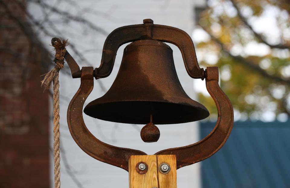 The dinner bell that was also used to alert family members who were making moonshine that strangers were approaching outside the Hutchins home built in 1780 in Bardstown, Ky. on Oct. 24, 2023.
