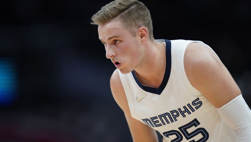 Memphis Grizzlies guard Sam Merrill stands on the court in the second half of an NBA basketball game against the Washington Wizards, Friday, Nov. 5, 2021, in Washington. (AP Photo/Patrick Semansky)