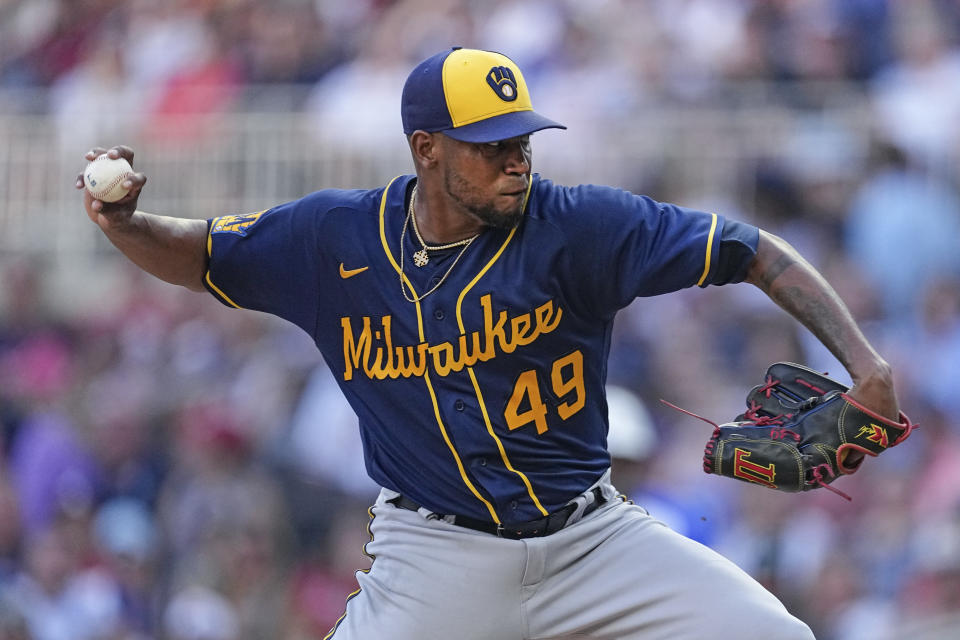 FILE -Milwaukee Brewers starting pitcher Julio Teheran delivers to an Atlanta Braves batter during the first inning of a baseball game Saturday, July 29, 2023, in Atlanta. The New York Mets have agreed to a contract with veteran starter Julio Teheran, according to a person familiar with the deal. The person spoke to The Associated Press on condition of anonymity Wednesday, April 3, 2024 because no announcement had been made.(AP Photo/John Bazemore, File)