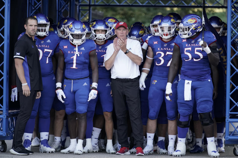 LAWRENCE, KS - SEPTEMBER 02:  Head coach Lance Leipold of the Kansas Jayhawks stands with his team prior to a game against the Tennessee Tech Golden Eagles at David Booth Kansas Memorial Stadium on September 2, 2022 in Lawrence, Kansas. (Photo by Ed Zurga/Getty Images)