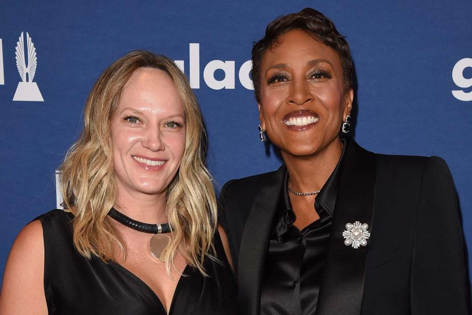 <p>J. Merritt/Getty</p>  Amber Laign and Robin Roberts