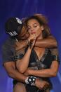 <p>Jay-Z hugged his wife on stage in Paris, France, during their 2014 OTR tour.</p>