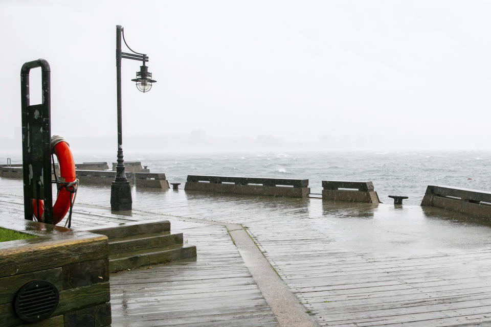 Waves crash along the Halifax waterfront in Halifax, Nova Scotia, on Saturday, Sept. 16, 2023. Severe conditions were predicted across parts of Massachusetts and Maine, and hurricane conditions could hit the Canadian provinces of New Brunswick and Nova Scotia, where the storm, Lee, downgraded early Saturday from hurricane to post-tropical cyclone, was expected to make landfall later in the day. (Kelly Clark /The Canadian Press via AP)