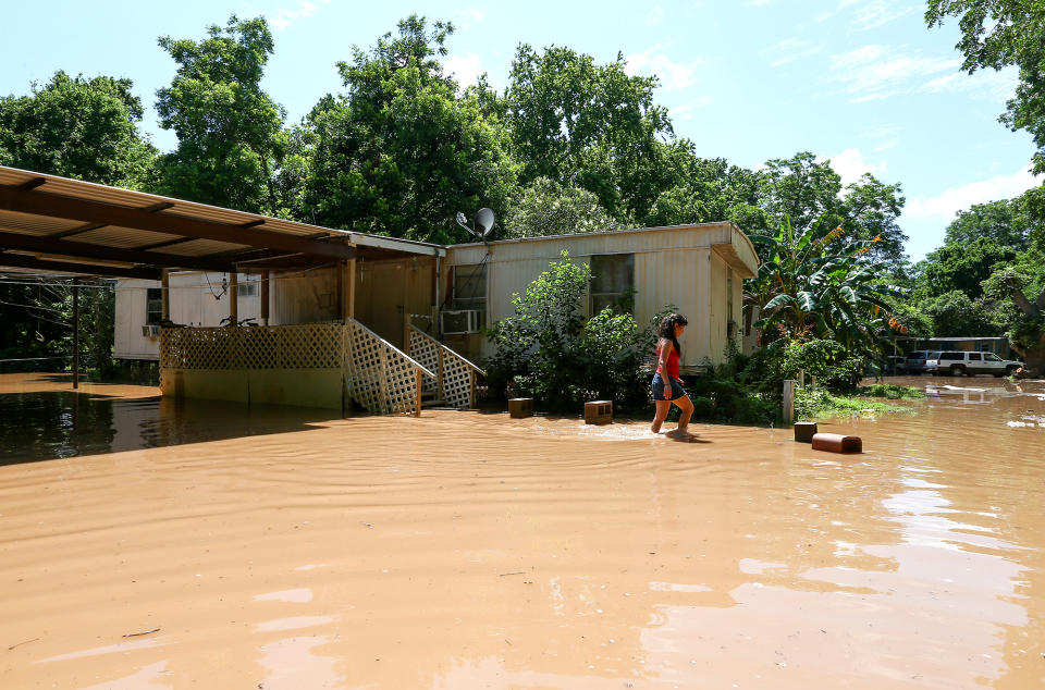 Swollen river feeds Texas flooding