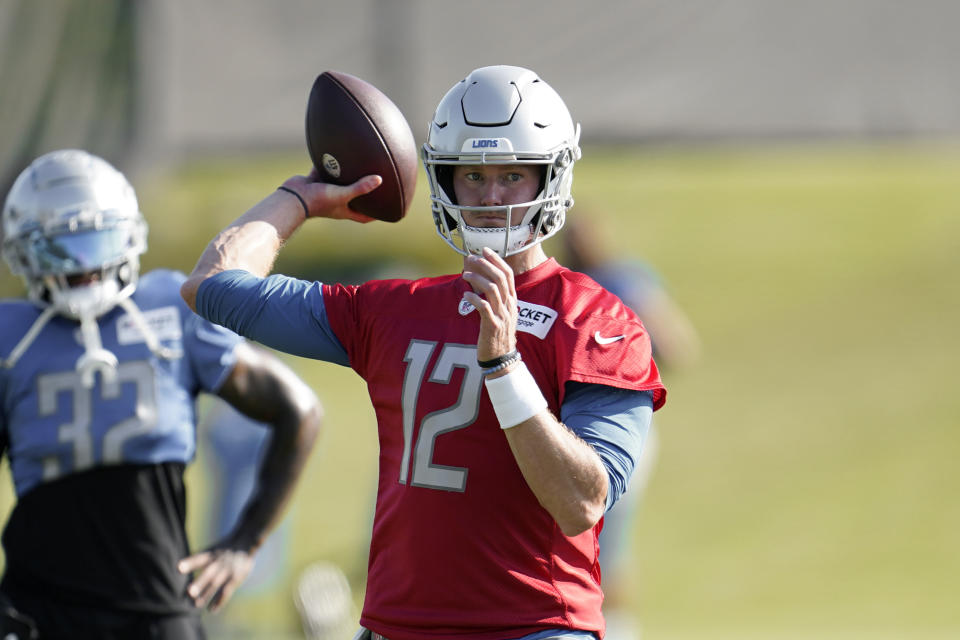 Detroit Lions quarterback Tim Boyle throws during an NFL football practice in Allen Park, Mich., Saturday, July 30, 2022. (AP Photo/Paul Sancya)