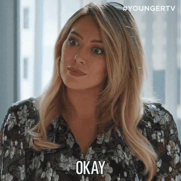 A GIF of Hilary Duff sarcastically saying "okay"