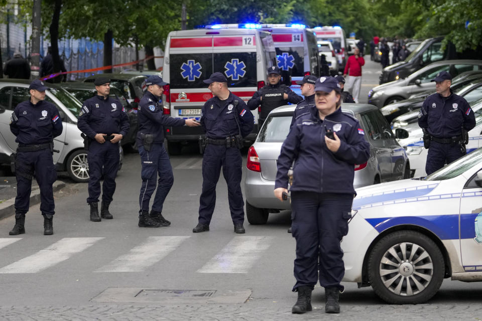 Police block streets around the Vladislav Ribnikar school in Belgrade, Serbia, Wednesday, May 3, 2023. A teenage boy opened fire early Wednesday in a school in central Belgrade, causing injuries. (AP Photo/Darko Vojinovic)