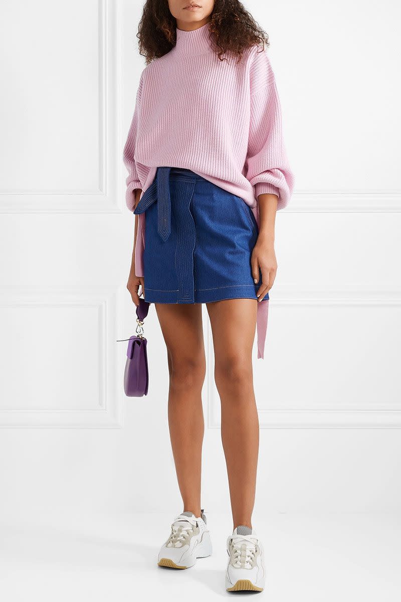 <p>Oversized tie detail wool sweater, £240, Paper London @ Net-a-Porter</p><p><a rel="nofollow noopener" href="https://www.net-a-porter.com/gb/en/product/1079256/paper_london/candyfloss-oversized-tie-detailed-wool-turtleneck-sweater" target="_blank" data-ylk="slk:BUY NOW;elm:context_link;itc:0;sec:content-canvas" class="link ">BUY NOW</a></p>