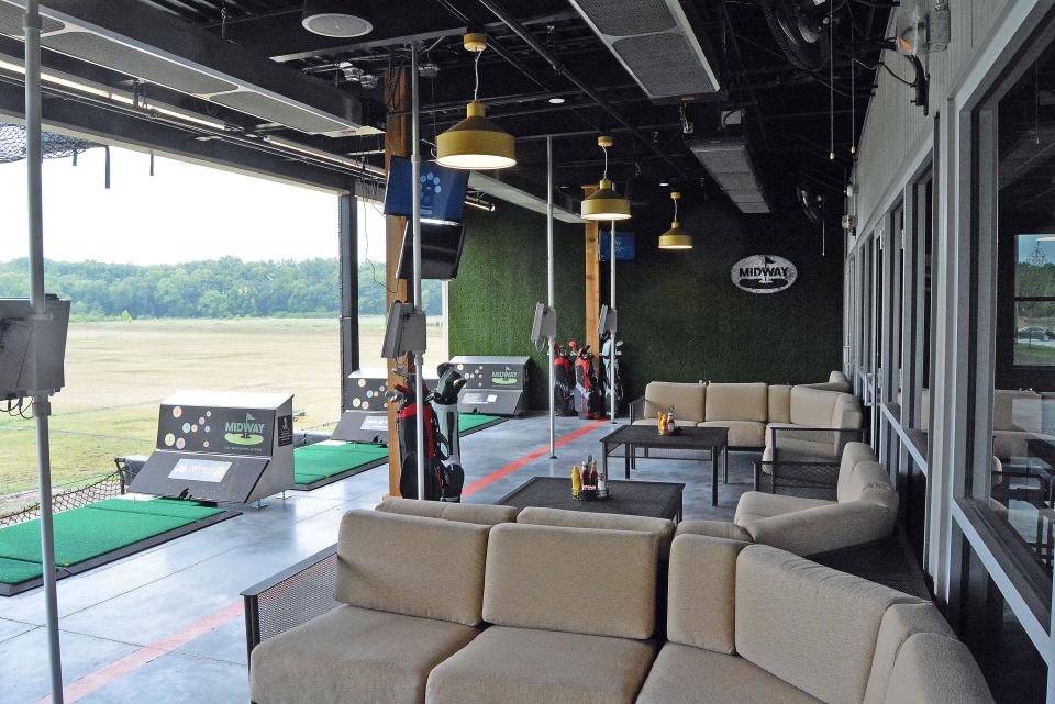 A view of the TopTracer driving range bays Tuesday available at Midway Golf and Games. The grand opening of the new sports entertainment venue is July 29. 