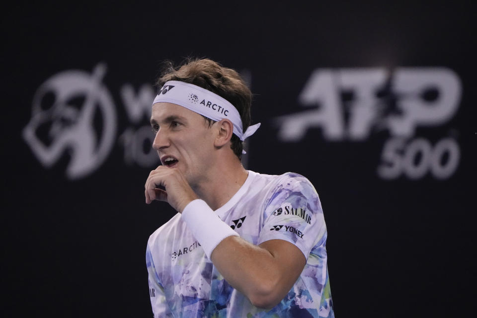 Casper Ruud of Norway reacts during the men's singles quarterfinal match against against Carlos Alcaraz of Spain in the China Open tennis tournament at the Diamond Court in Beijing, Monday, Oct. 2, 2023. (AP Photo/Andy Wong)